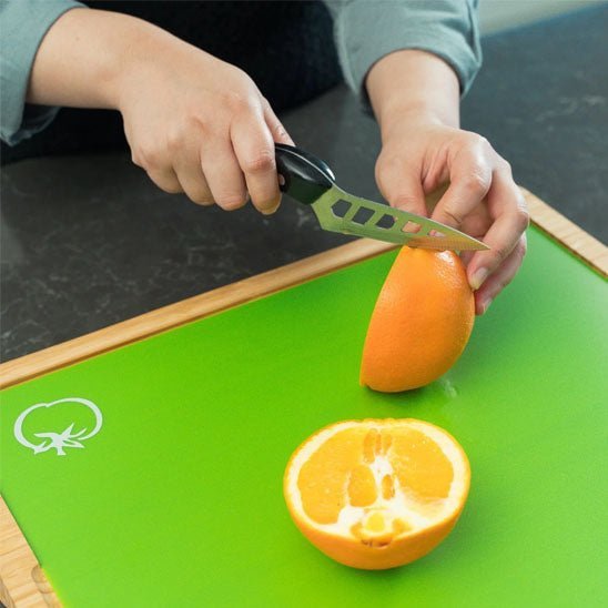 planche-a-decouper-oranges-couteau
