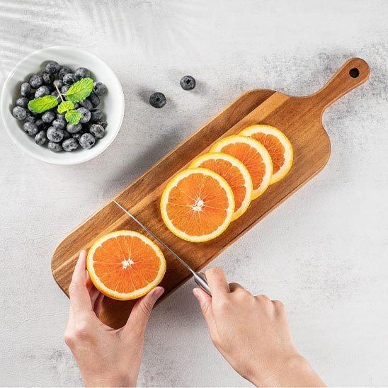 planche-a-decouper-en-bois-oranges